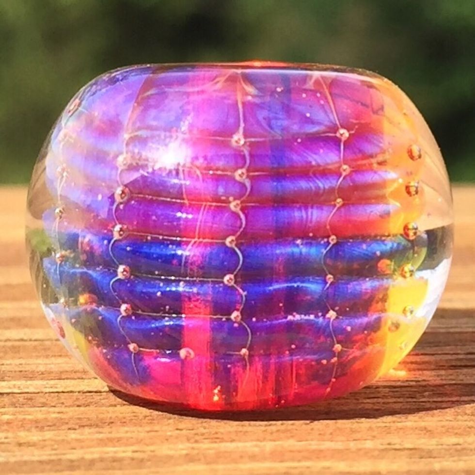 Here is the finished bead.  Give it a try!  You can also try it without the molds, with different molds, or with an opaque white layer under the Rhea.