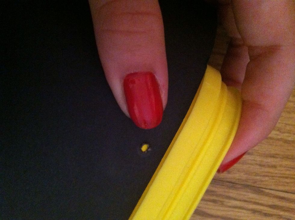 Here is the hole. You may need to keep poking it to make it big enough.