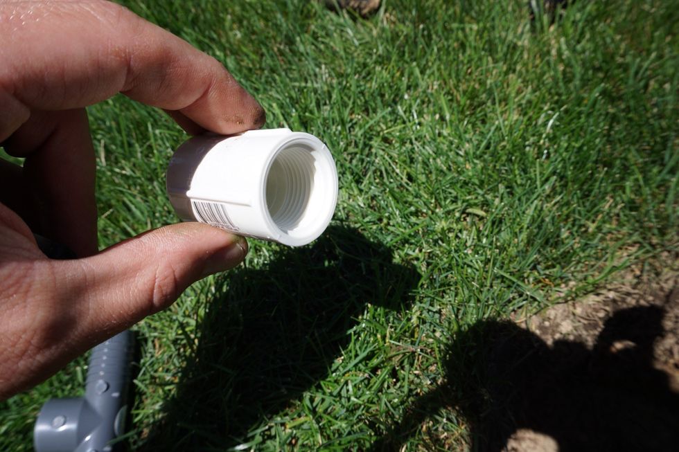 Here is the PVC coupling. Note the threads. In the store, there are also ones that are smooth - make sure you get the right one or you will be making another trip! Also double check the diameter!