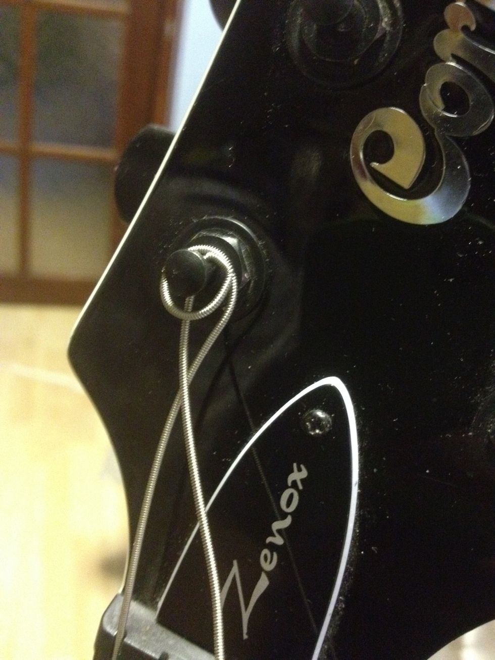 Here is the second wind, with the extra length OVER the string