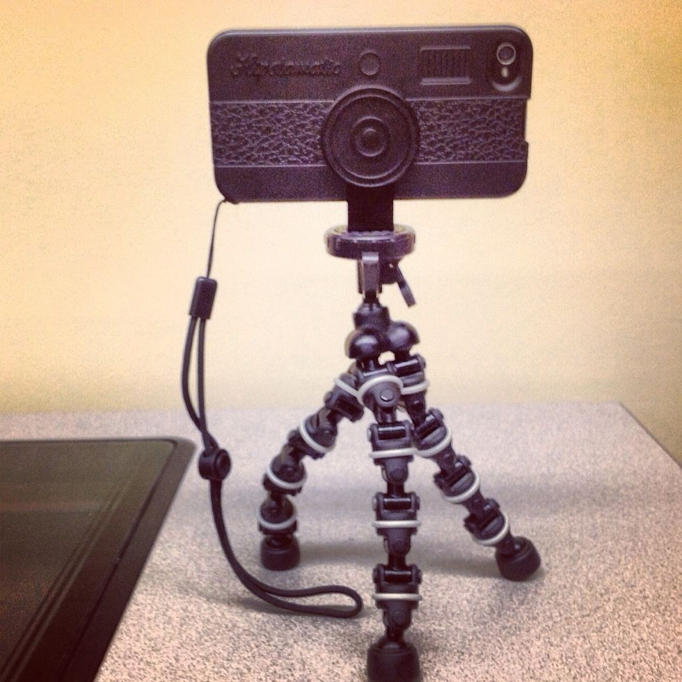 Here is the setup when it is together. Love the tripod since it will wrap around things that a normal tripod can't stand on.