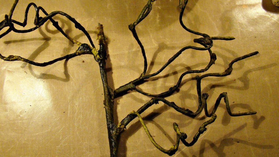 Here is the tree after it's been painted  ready to glue to the back of the coffin. Don't forget to hang your spiders,  also hot glue some floral moss here and there.