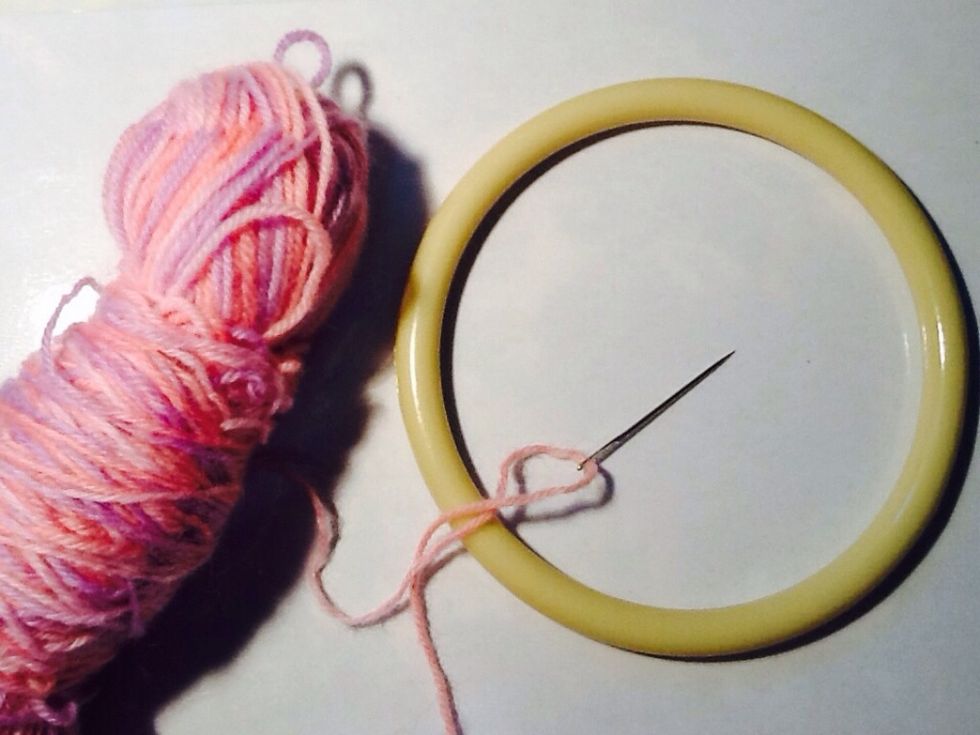 Here is the yarn I am using for the wrapping around. You'll also need a needle for later.