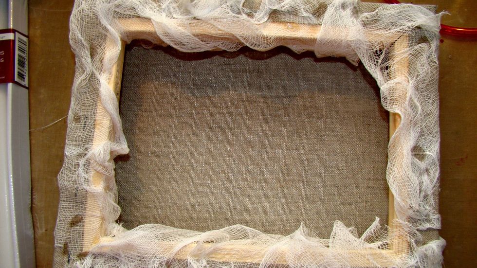 Here is what the canvas looks once the cheese cloth has been applied.