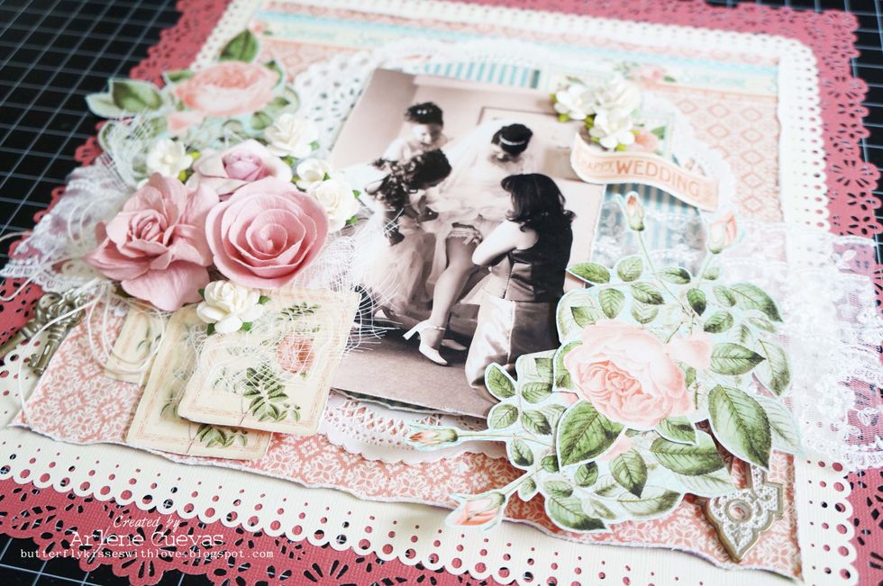 Here is what the page looked like before I adhered everything down. I usually play around with the elements and move them around the page until I'm satisfied with where things will go...