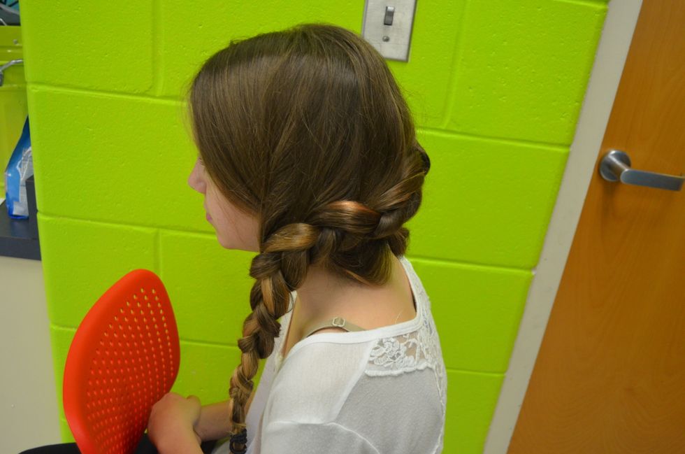 Here is your finished Katniss braid! You can put hairspray on it to make it hold longer and put bobby pins in if you want but you don't really need to! May the odds be ever in your favor!