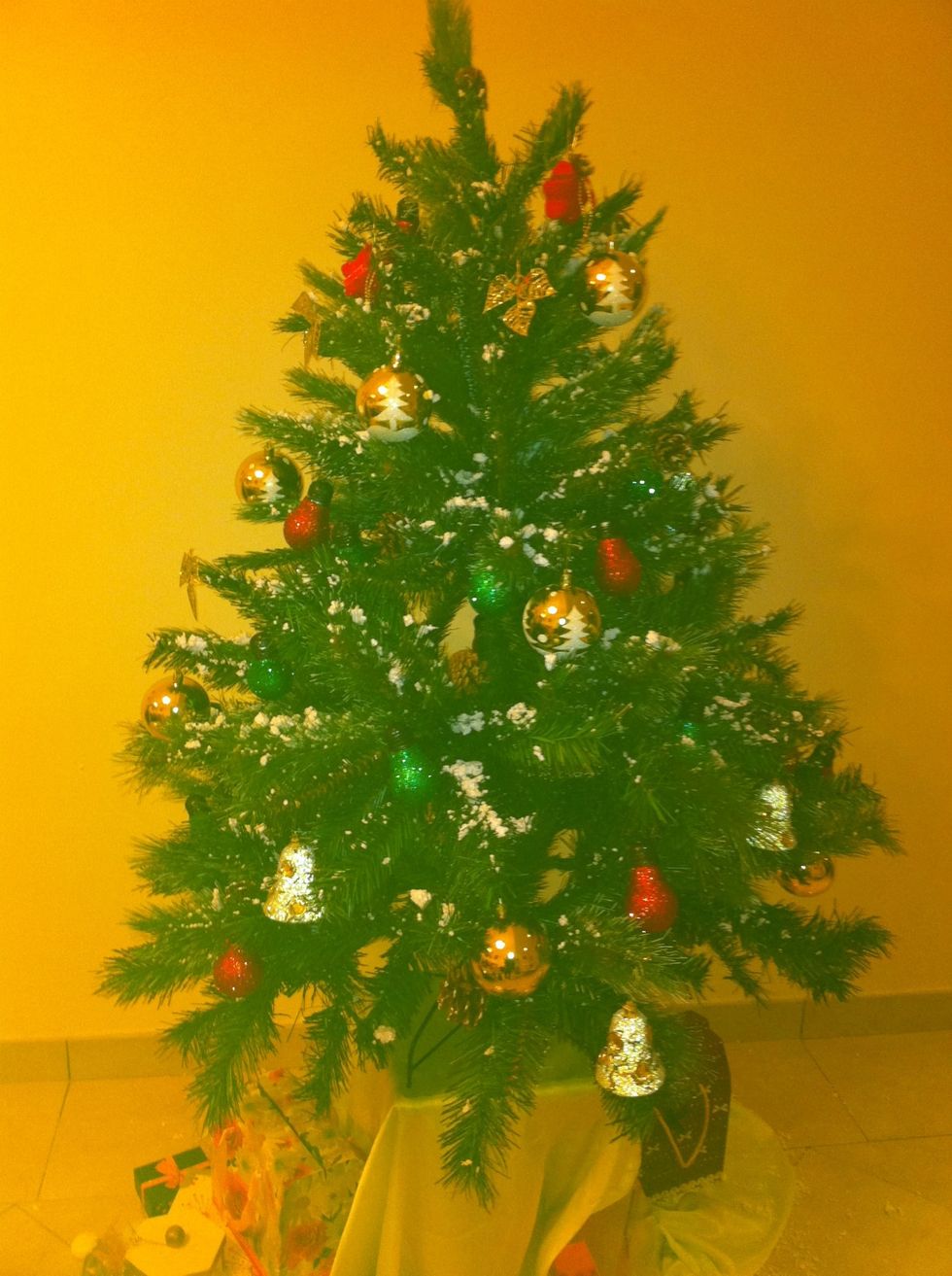 Here is your tree with some shiny balls. Now you helped the earth by recycling.