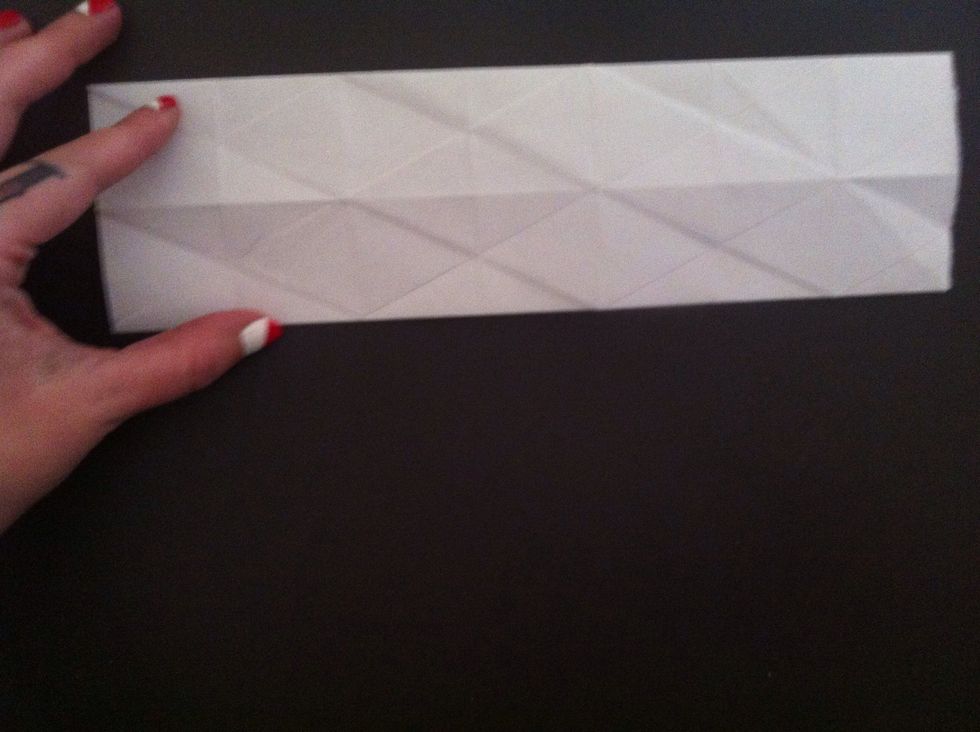 Here it is all folded & creased really well. I flipped it over, so now all those lines I drew are on other side. Don't forget to do this.