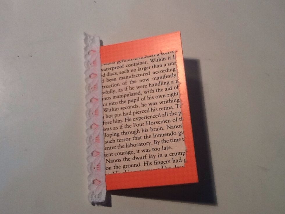 Here it is attached on, leaving a small part of the lace border hanging off the side.