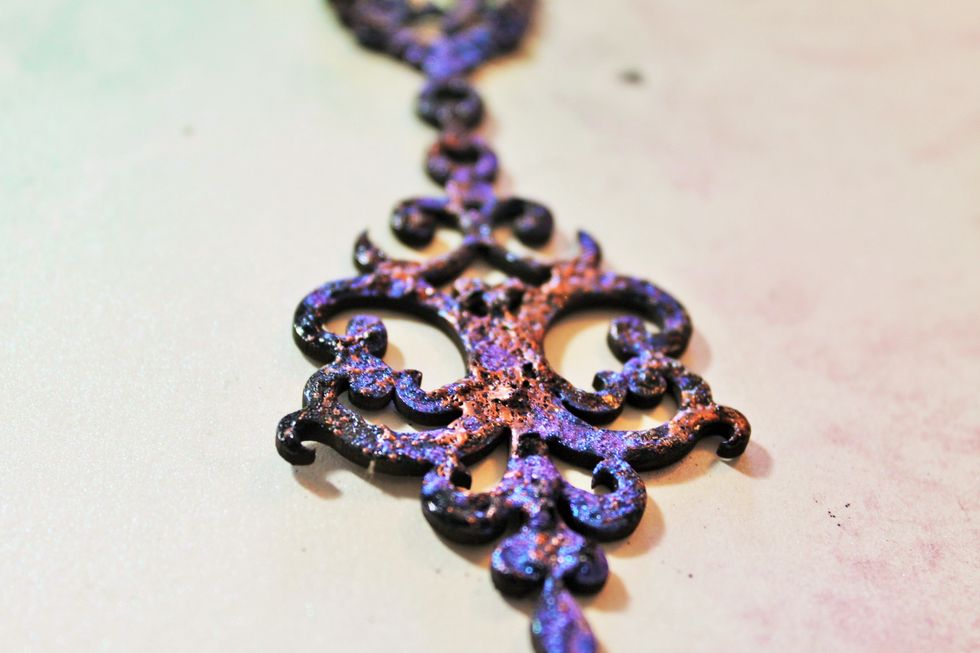 Here's a close look at the distressed piece. The mica powders are now set in the paint.