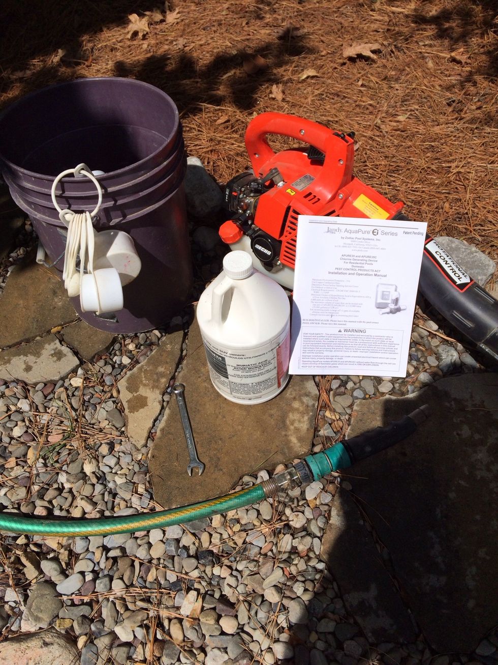Here's a look at what you'll need- your , blower, wrench, muriatic acid, measuring cups, container and instructions for the chlorine generator