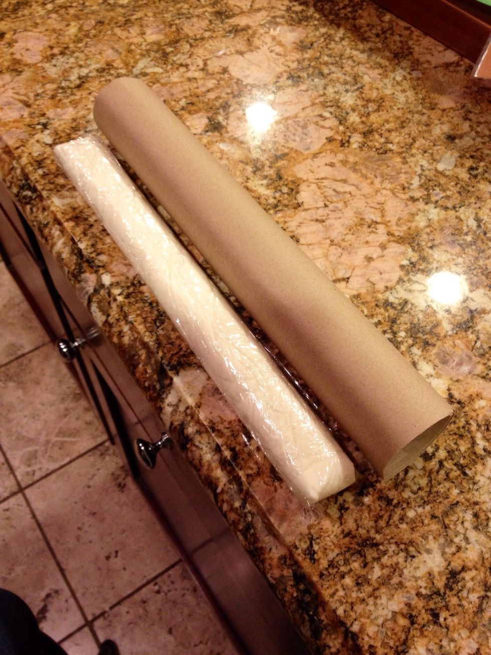 Here's a tip to keep them from having flat bottoms: before you put them in the fridge to chill, find an old wrapping paper tube or paper towel roll and cut it down to the size of your candy roll.