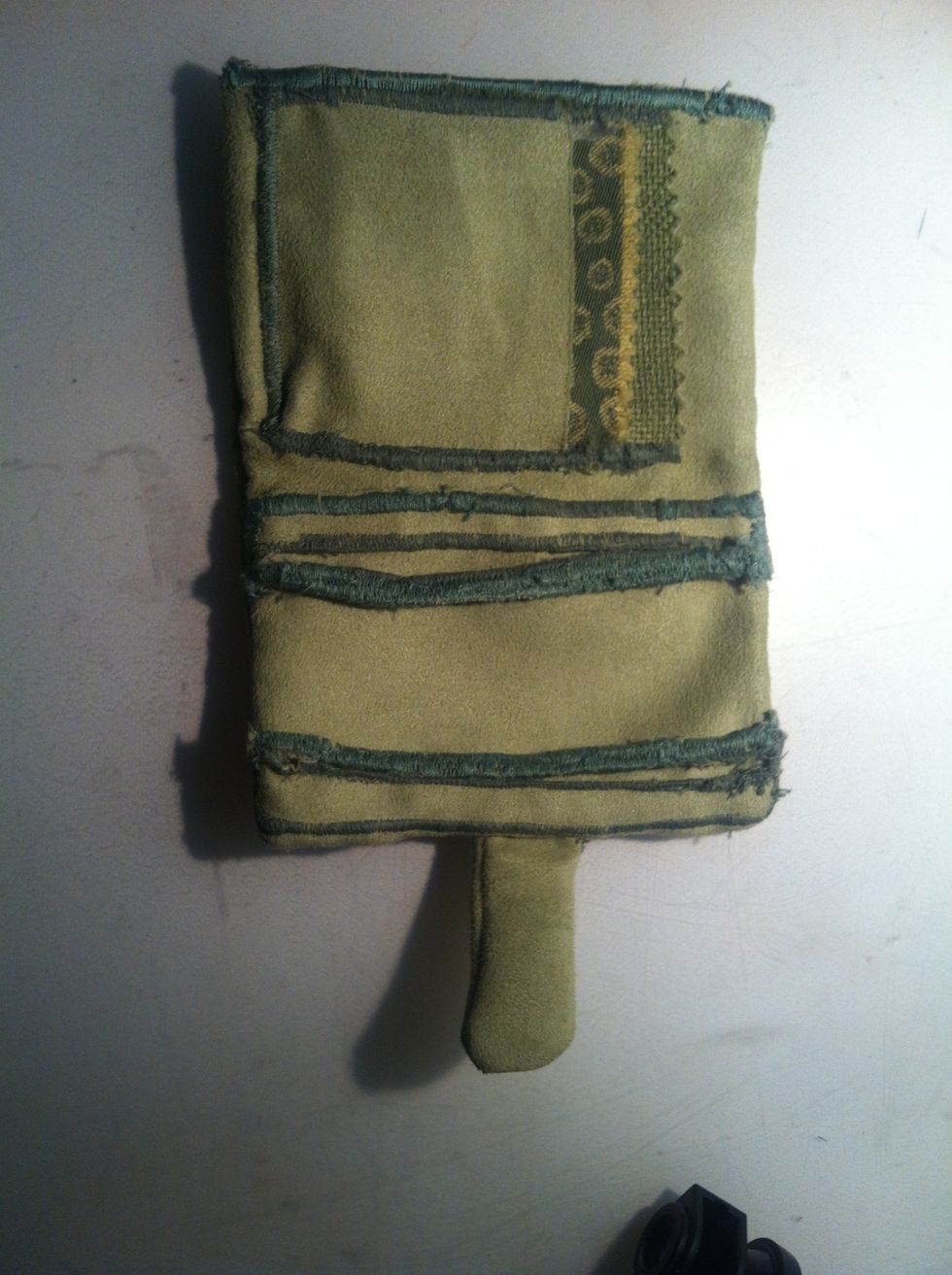 Here's another one I made. For this one, I added three pockets by sewing one on top of another.