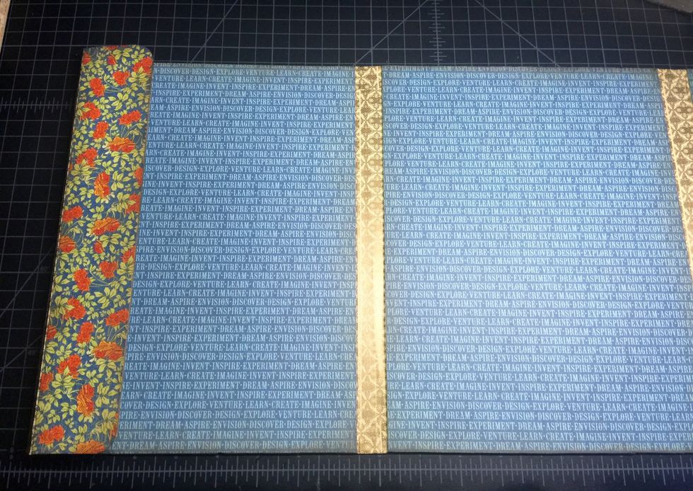 Here's inside the photo portfolio once I have all the design paper layered down. TIP: If you are using magnets to hold your portfolio shut, don't forget to adhere them down under the design paper!