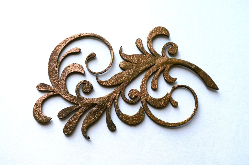 Here's my finished piece! The black stays inside the grooves of the cracks, but wipes right off the top coat to let your beautiful color shine through!