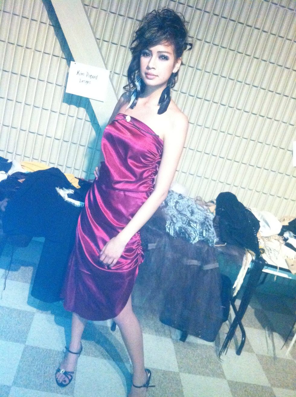 Here's one of my models modeling out my dress. (Backstage actually before the runway)