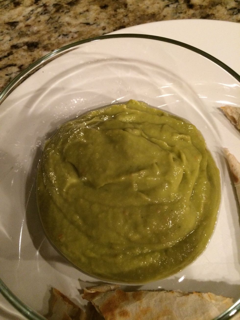Here's our guacamole sauce to use for dipping... You're gonna blend the avacados, tomato, onion, garlic salt and lime juice from your lime...(I try to get all the juice I can!)