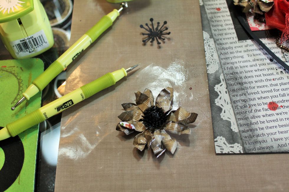 Here's the centers I created for the larger flowers using 7 layered pieces from the Starburst punch.