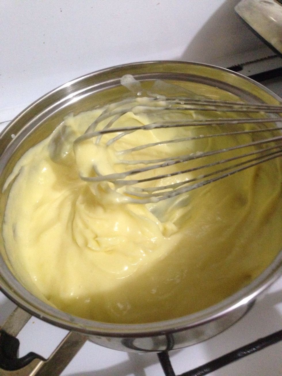 Here's the consistency you want. Remove from heat and add vanilla extract. I split my cream into 2 bowl..1 with vanilla extract, and the other half I put in some chocolate chips to make choco cream