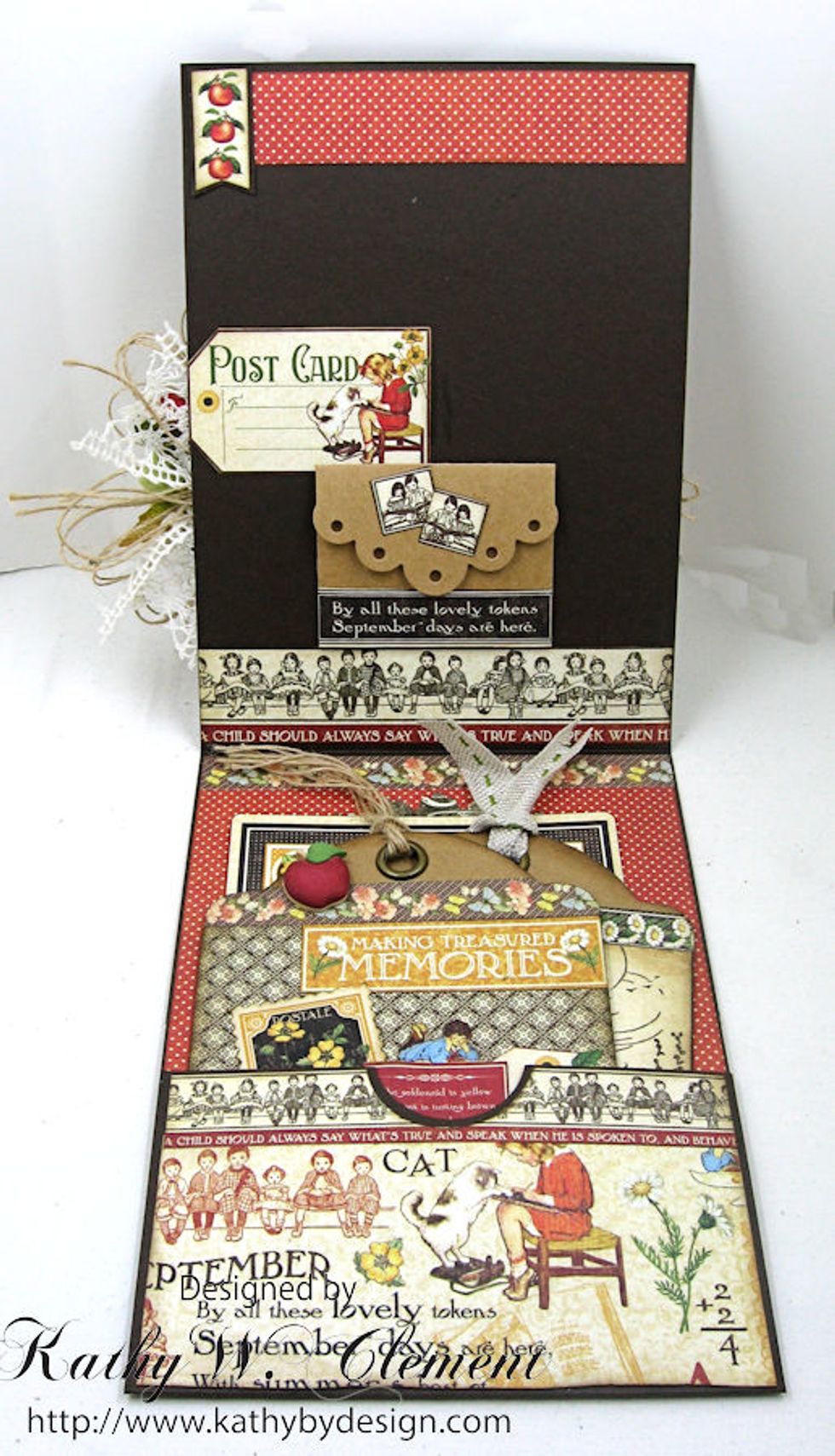 Here's the inside of my card. A mini envelope was die cut from kraft paper with Tammy Tutterow's deco edge die. The pocket is filled with an ephemera card & 2 decorated regular kraft Staples tags.