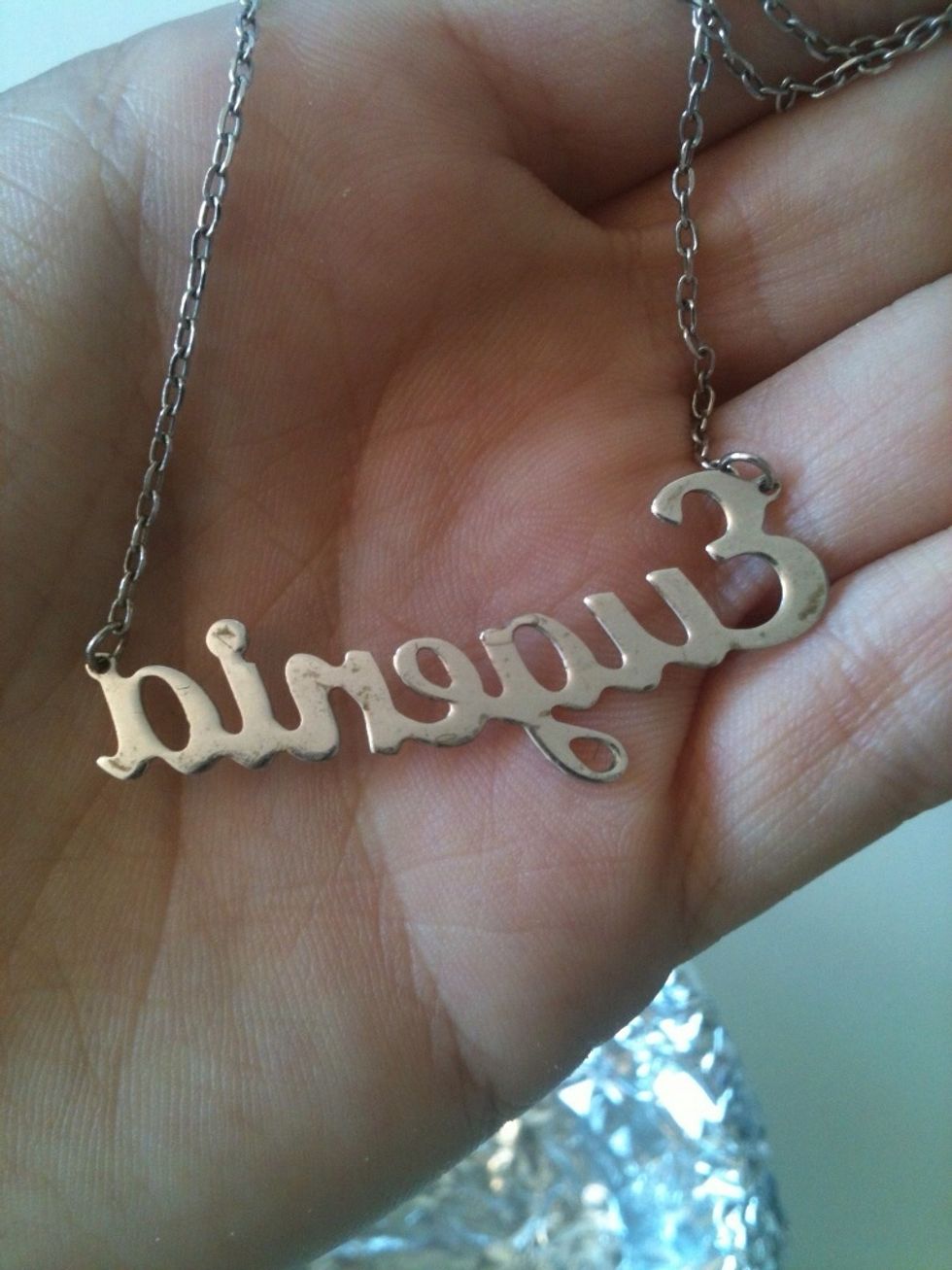 here's the necklace I want to clean. see how dirty the back is? in few minutes it will shine.
