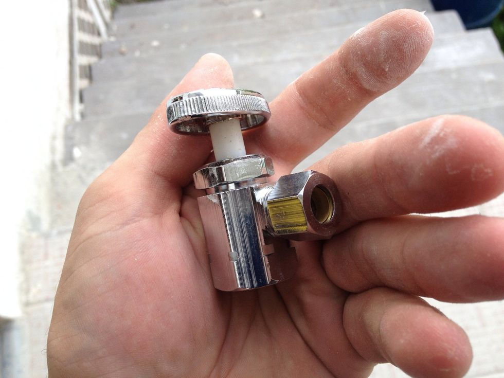 Here's the new valve out of the package. Cute little guy isn't it? Here's how it comes apart...
