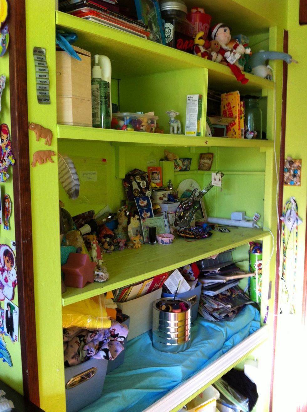 Here's the shelves by my door. They just hold trinkets, books, craft supplies, and cosplays. (You can see my seashell light switch that I made in another guide!)