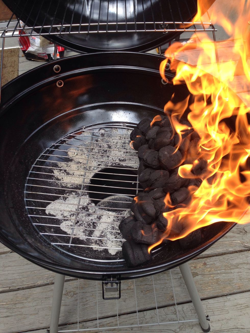 Here's the trick with smoking: indirect heat. When you're using a smaller grill (mine is 24" across), only place charcoal and/or wood chips on one side of the grill.