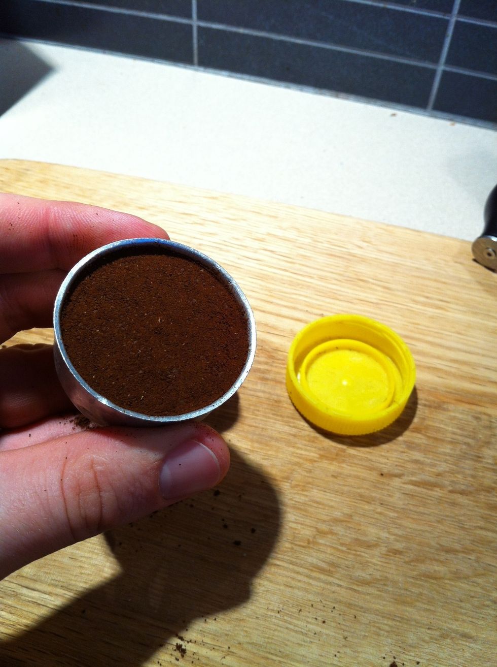 Here's what it should look like. BEWARE. If you tamp to firmly you will blow the pressure valve or lose a body part...