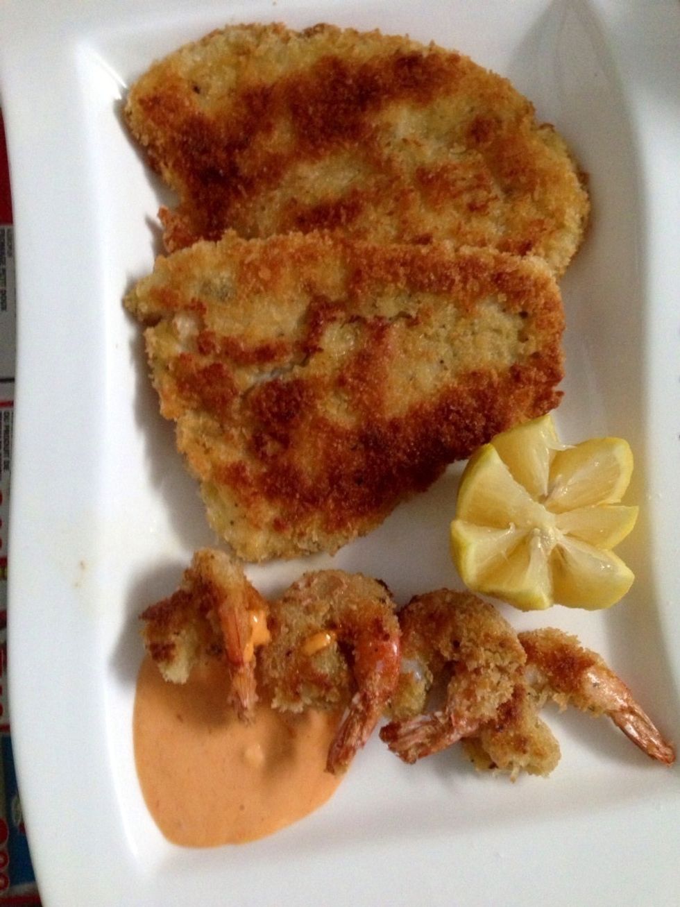 Here, serve them hot with lemon and mayo-chilli sauce. You can do the same with shrimps.