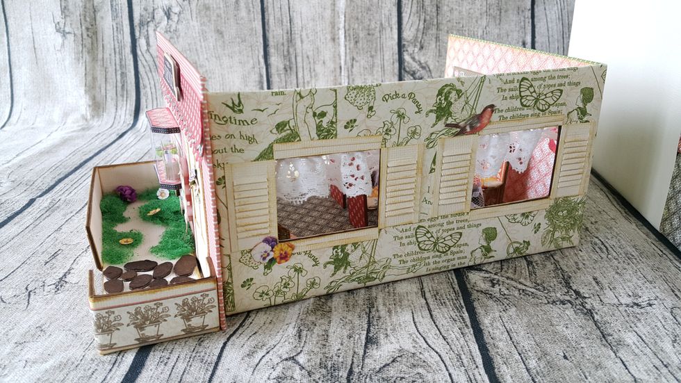 Here the back of the house, you can decorate with flowers and windows.