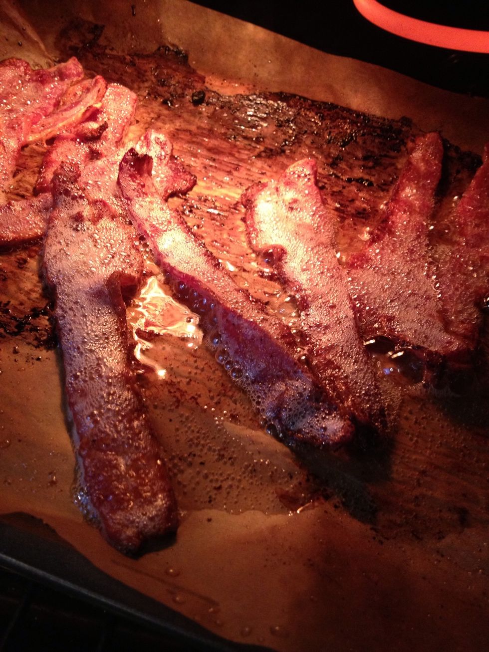Here the bacon sizzles and is almost ready.