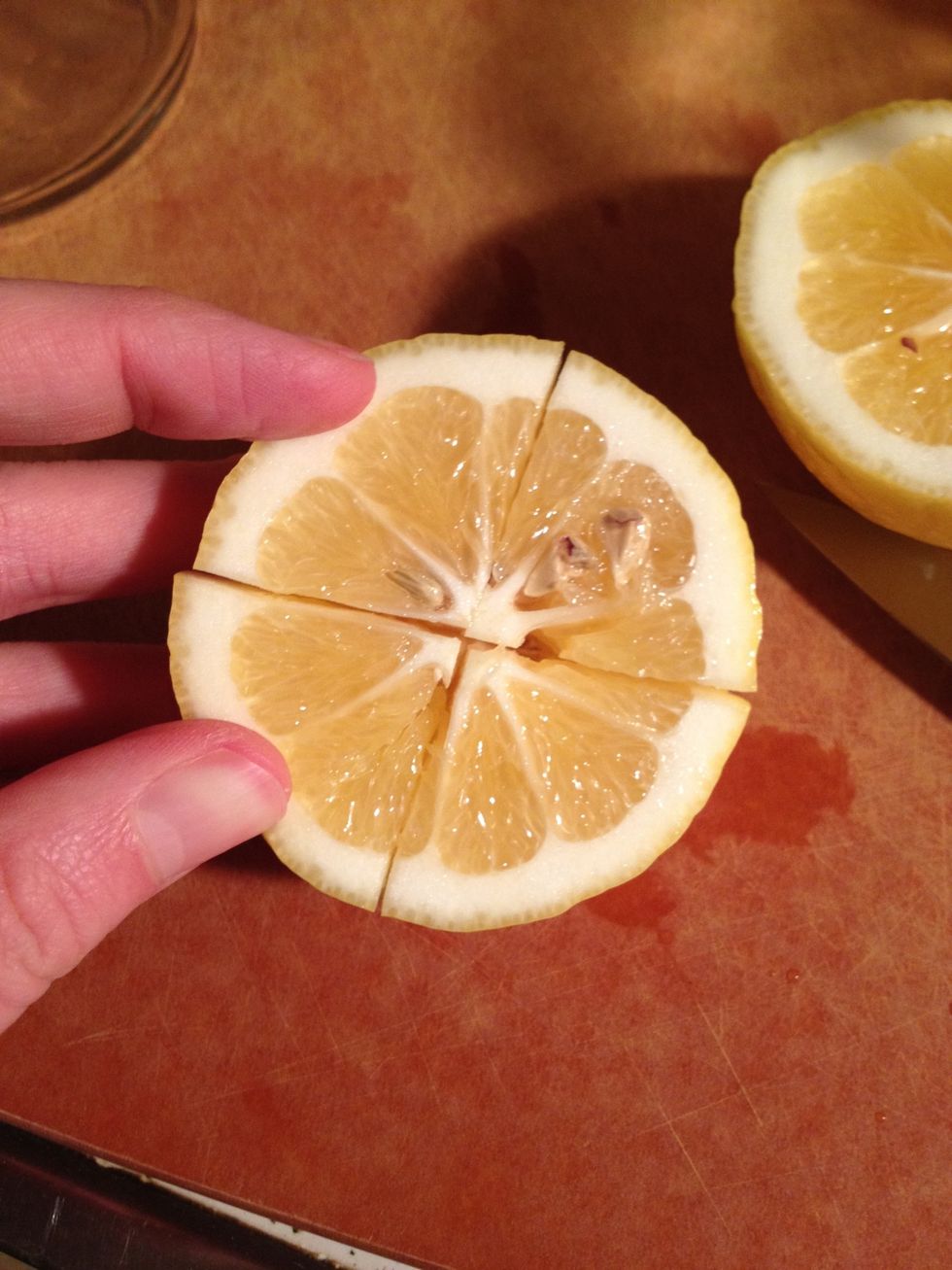 Here the lemon is quartered, but still in one piece
