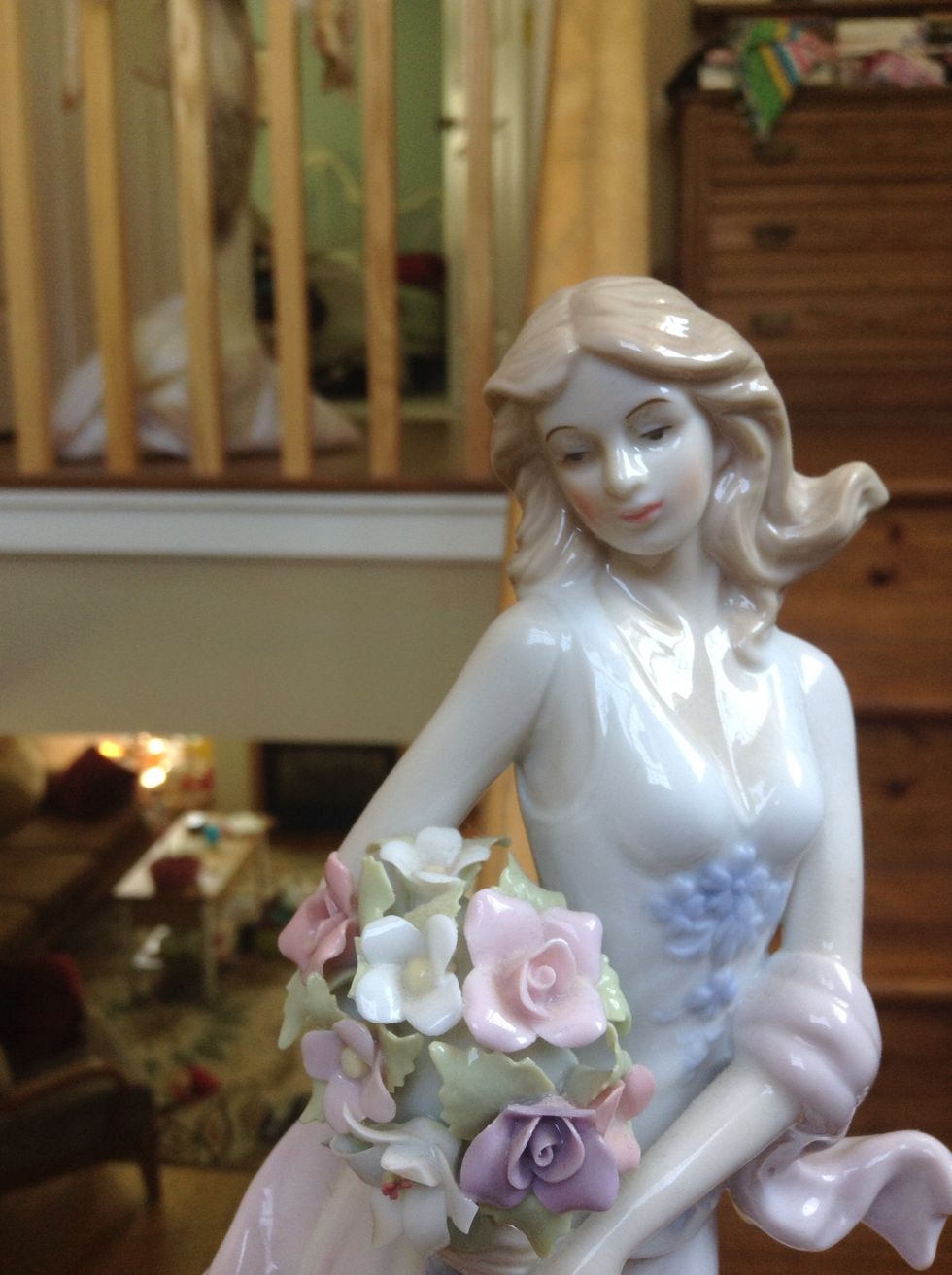 Here the lighting is even better, but the backround is too busy. Find a simple backdrop that won't take attention away from your subject.