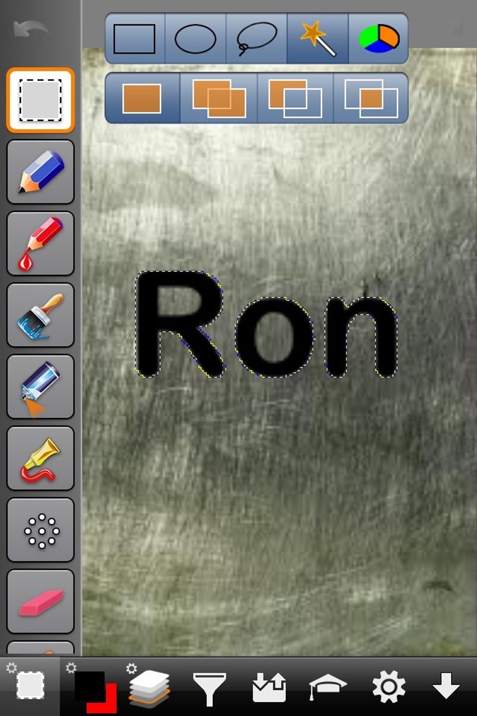 Here the text is selected. But notice the holes in the R and the O are not selected. We'll take care of this in a moment.