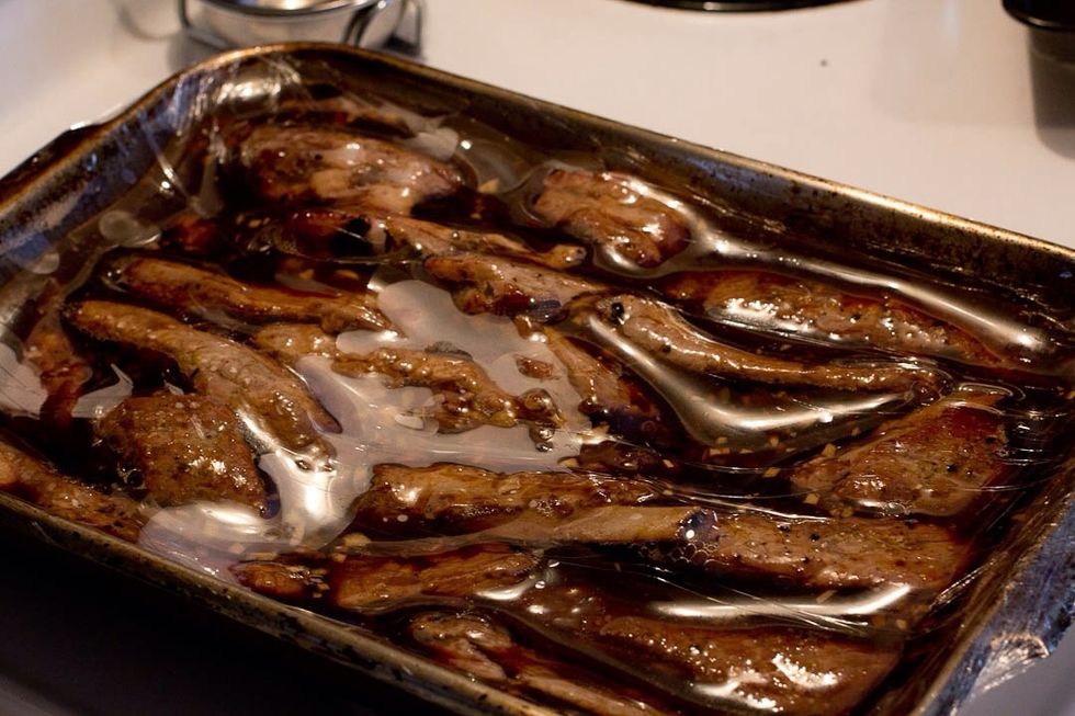 Here they are after 4 hours. Let them cool a bit with the plastic wrap on them. They really soak up the flavor this way.