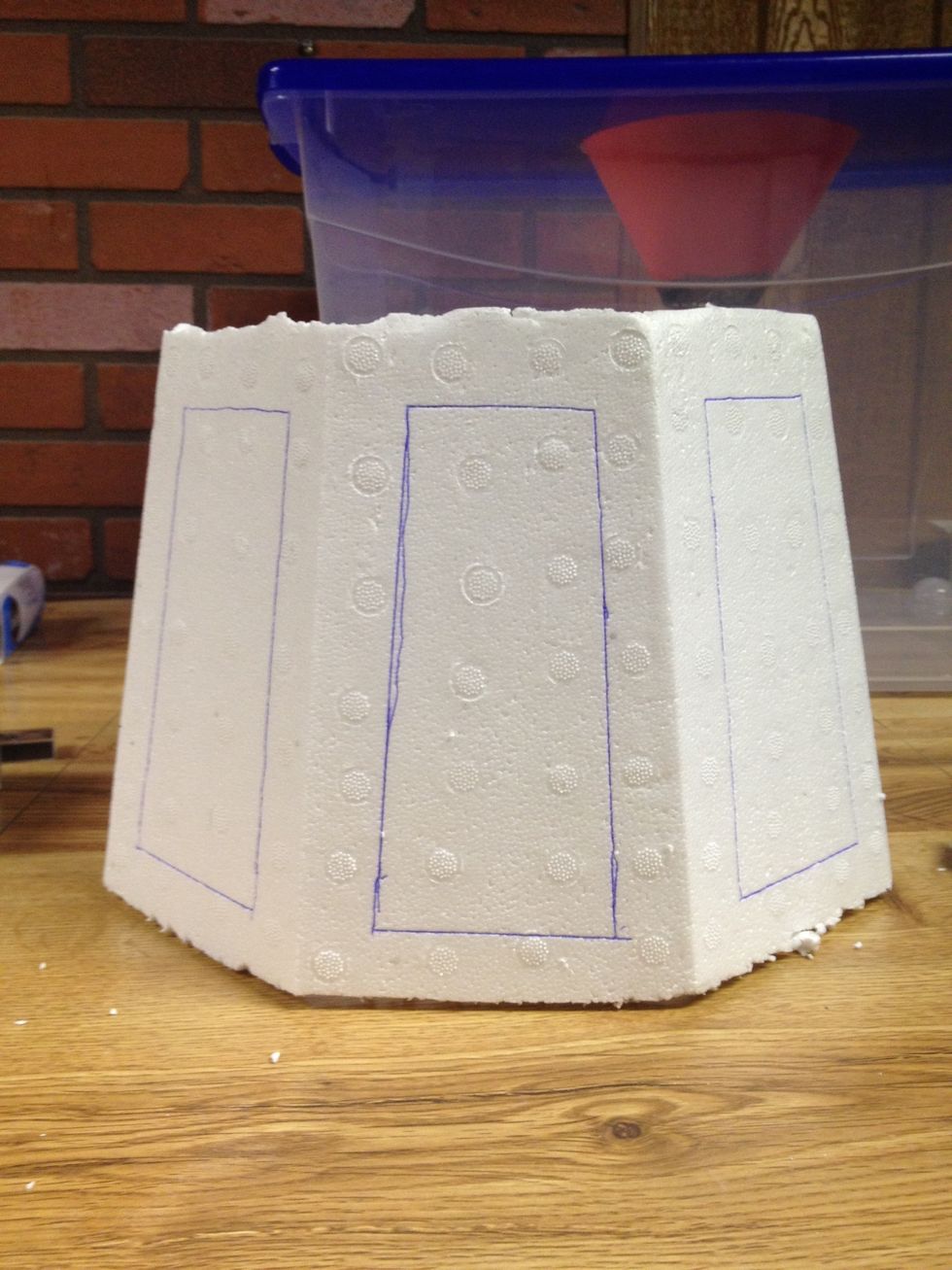 Here they are drawn on. I leave about a 1" border of styrofoam on all sides of each window. This will make the space big enough for the moths to see the light and enter the trap. Lets cut 'em out!