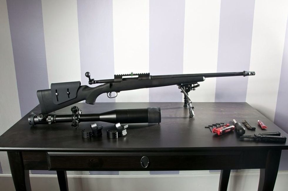 Here we have all of the pieces: rifle, scope, rings and tools.