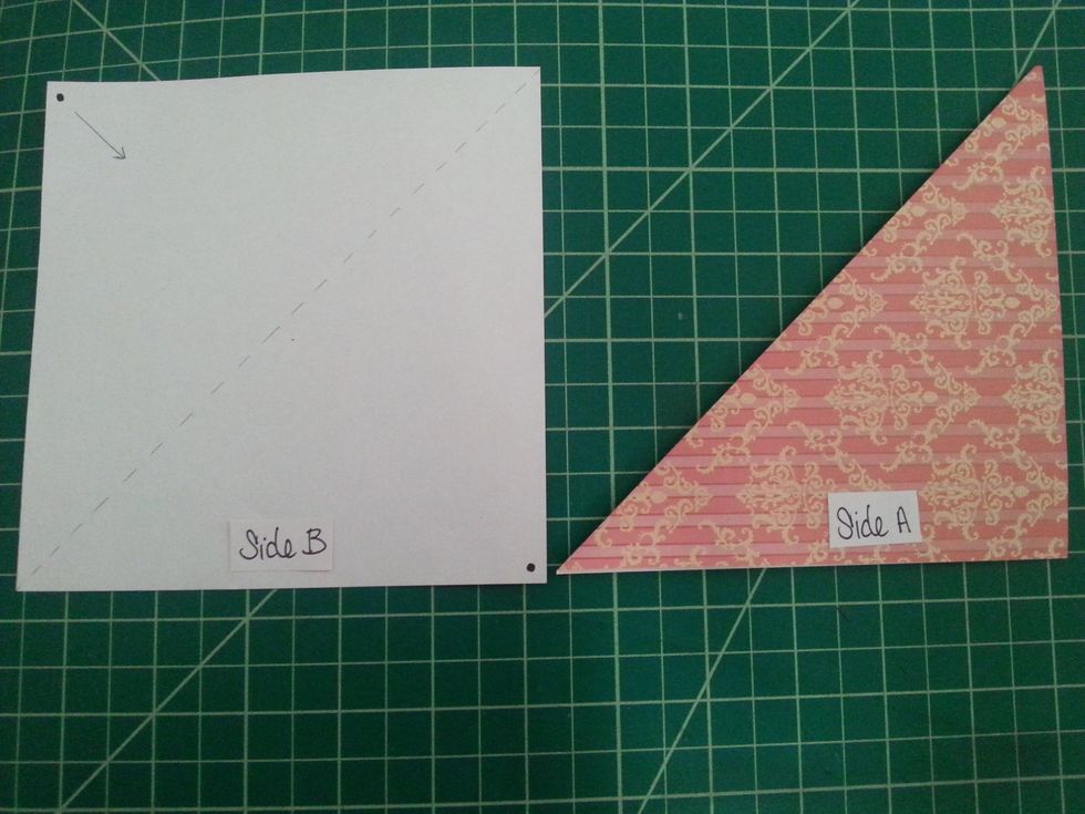 Here we'll do a Valley Fold, we'll take the top left hand corner & fold it diagonally to meet the bottom right hand corner (both corners are marked with dots). End shape should match shape on right.