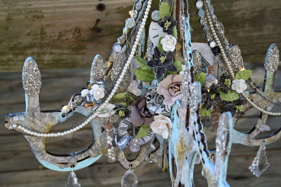 Here you can see all of the Prima goodness tucked in. Most of my pieces are from the Salvage District line. I wrapped in Lumies battery-operated LED lights, tucking the battery pack in the back.