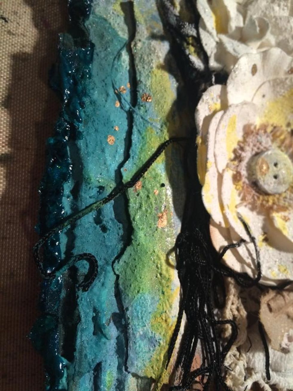 Here you can see layers of paper, Stucco paint, misting. I have also used the AA Gold mist in between some of the layers of other misting. It adds such a beautiful shimmer to the project