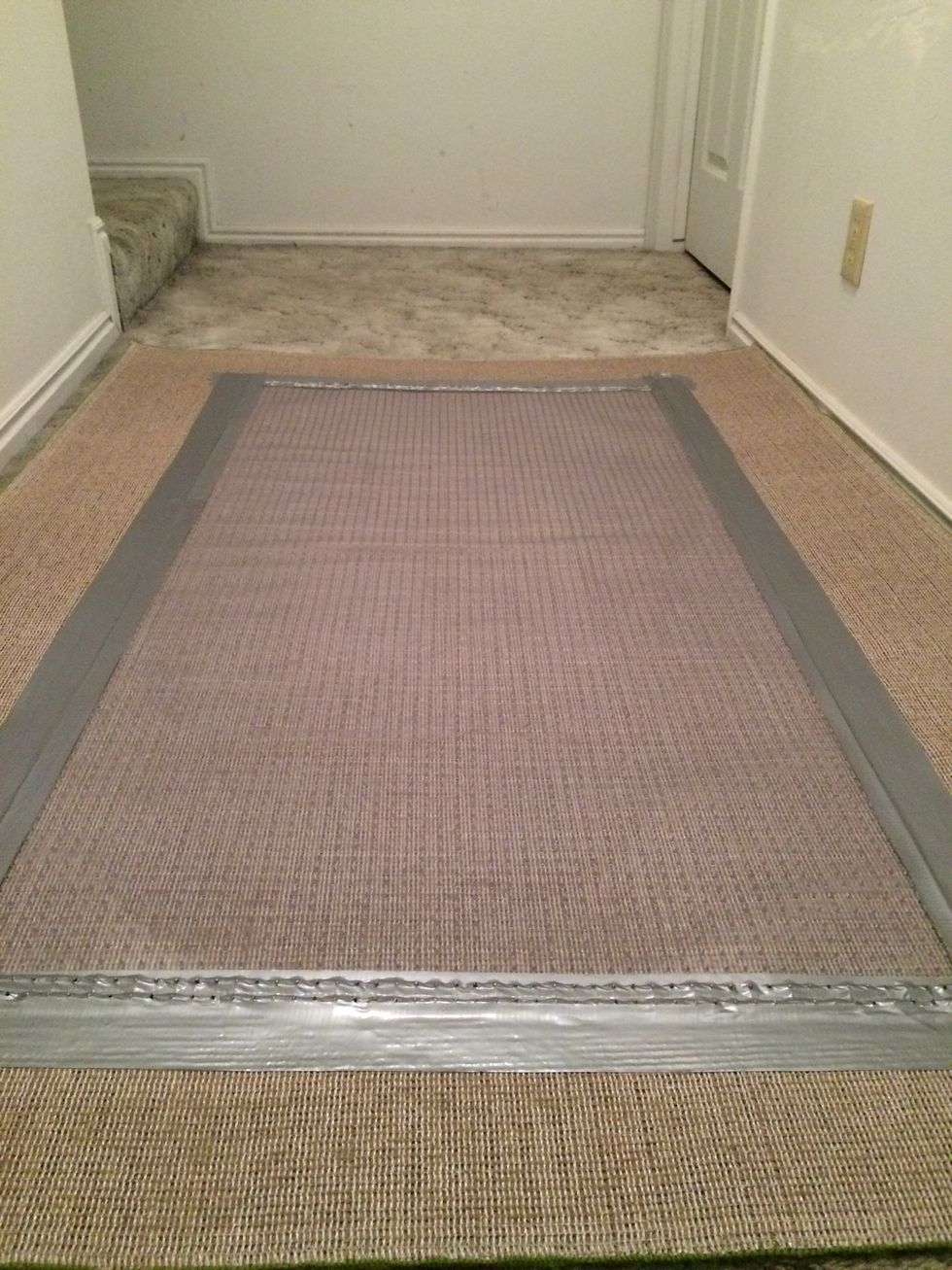 How to secure an area rug over carpet B+C Guides