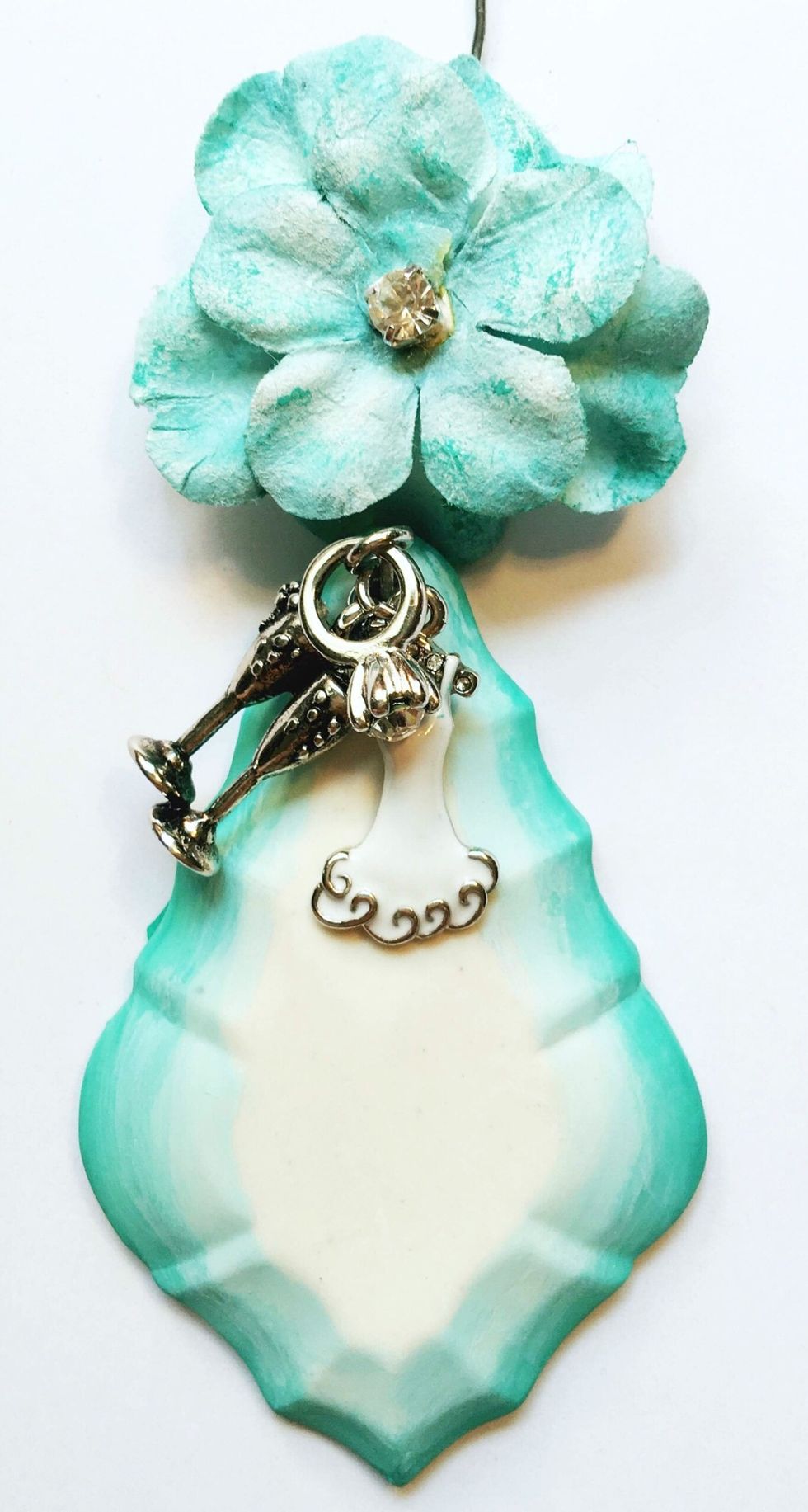 Here you can see the Chandelier Pendant with the chalked edges and the charms applied
