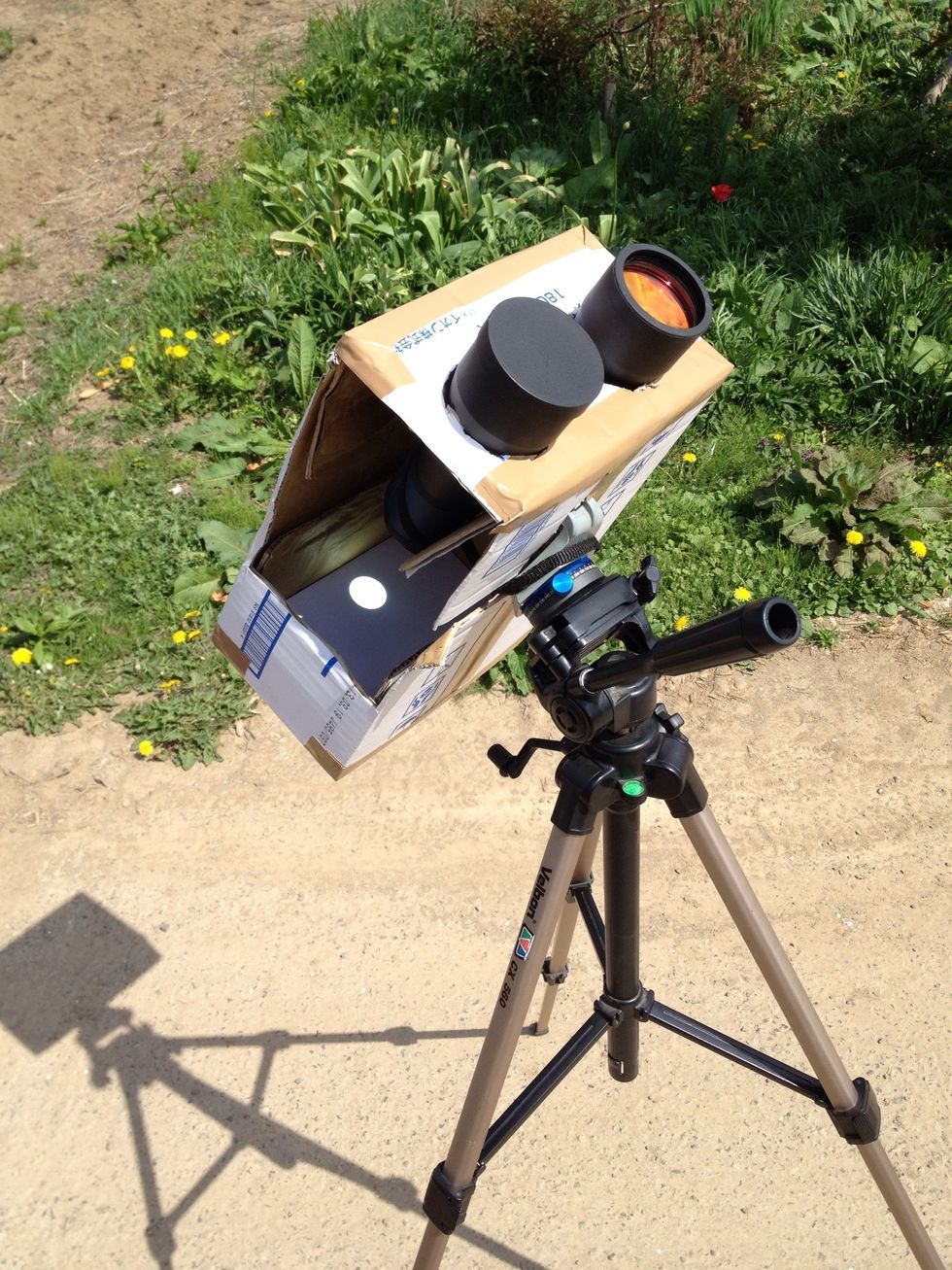 Here you can see the image of the sun on the back of the inside of the box. Note, you only need one lens of the binoculars uncovered or you will get two images.