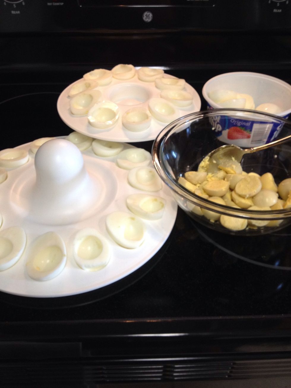 Here, you see I have my egg halves in my carrier, my egg yolks in my bowl (ready to be deviled), and my egg extras. \ud83d\ude0a