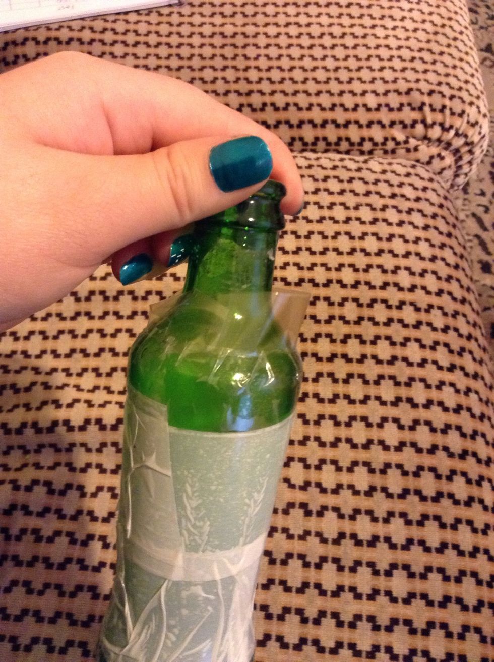 Here you see I'm adding tape to the bottle neck.