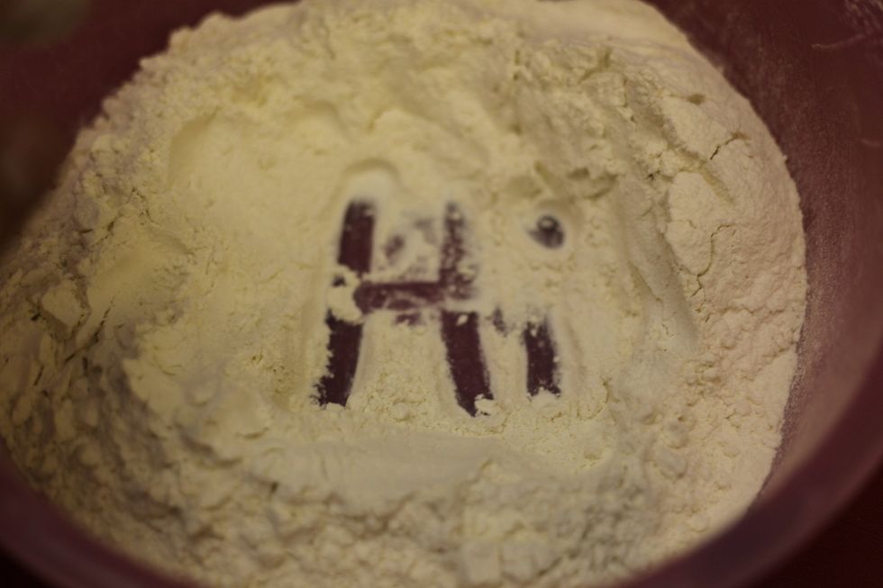 Hi dear friends following us on snapguide. It's all fun and games around here. So create a well in the centre of the flour. Let's check our yeast.