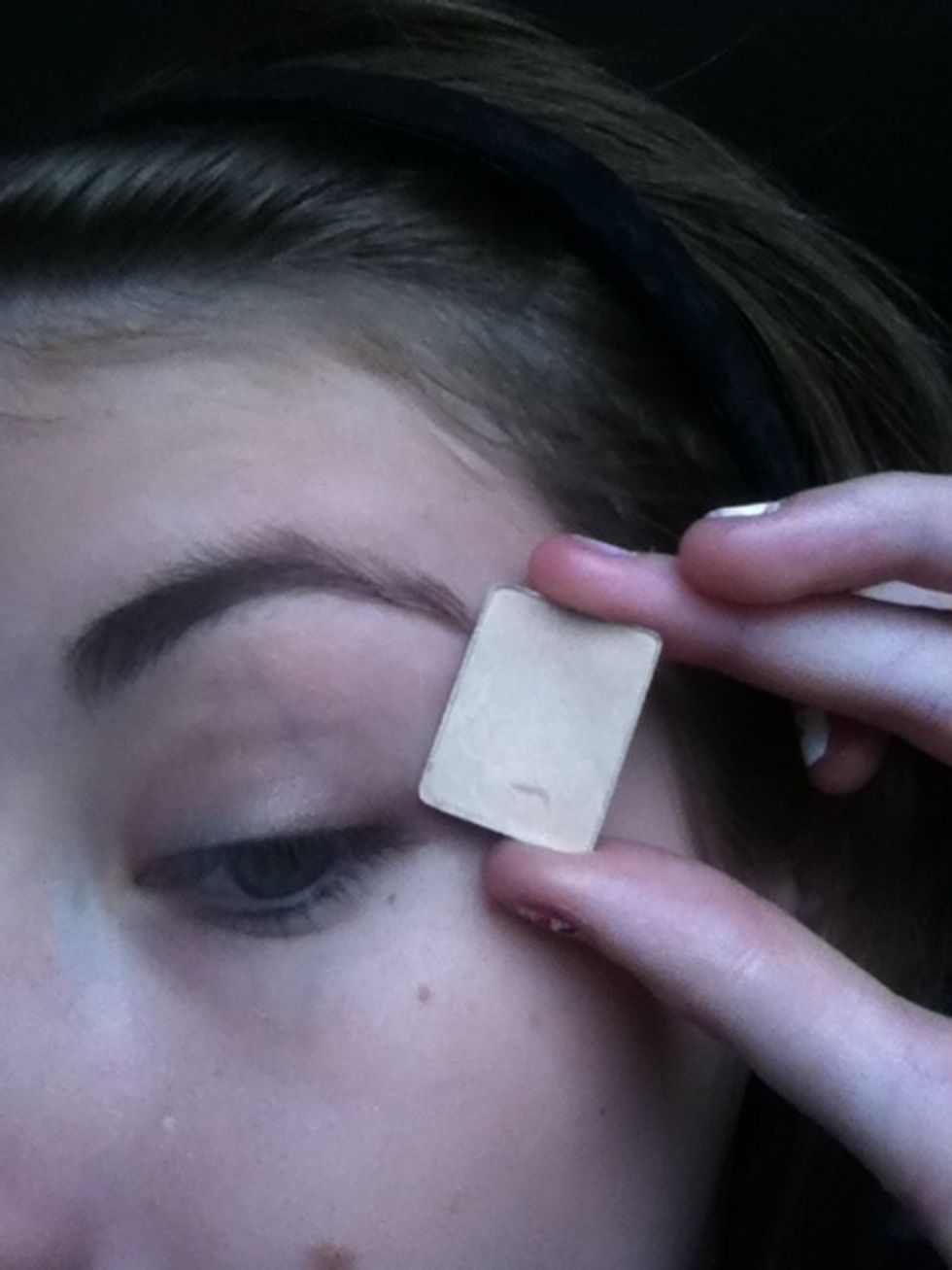 Highlight the brow bone.