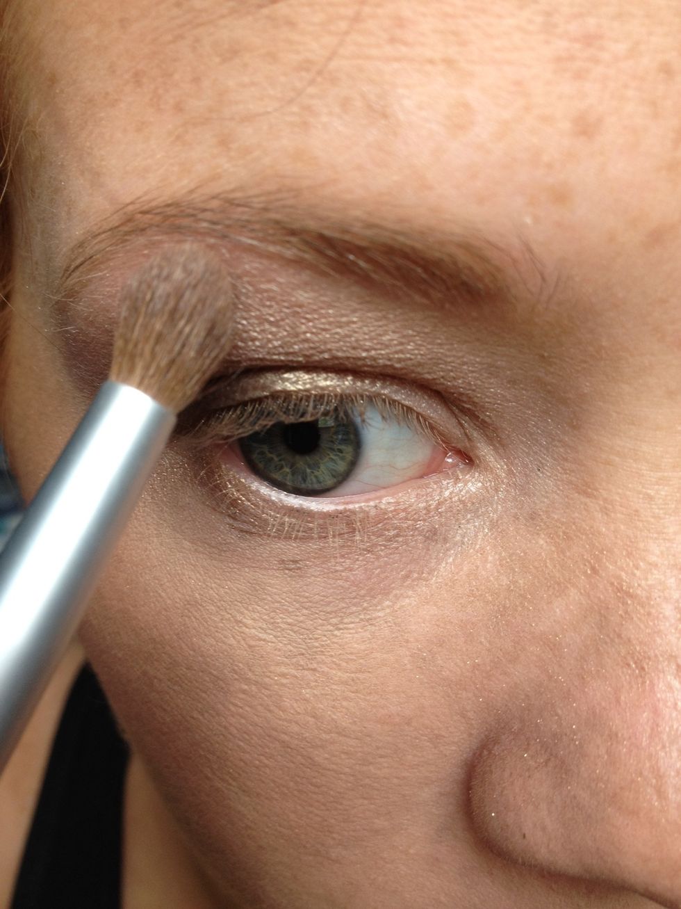 Highlight under your brow on the brow bone. This should be done with a lighter color