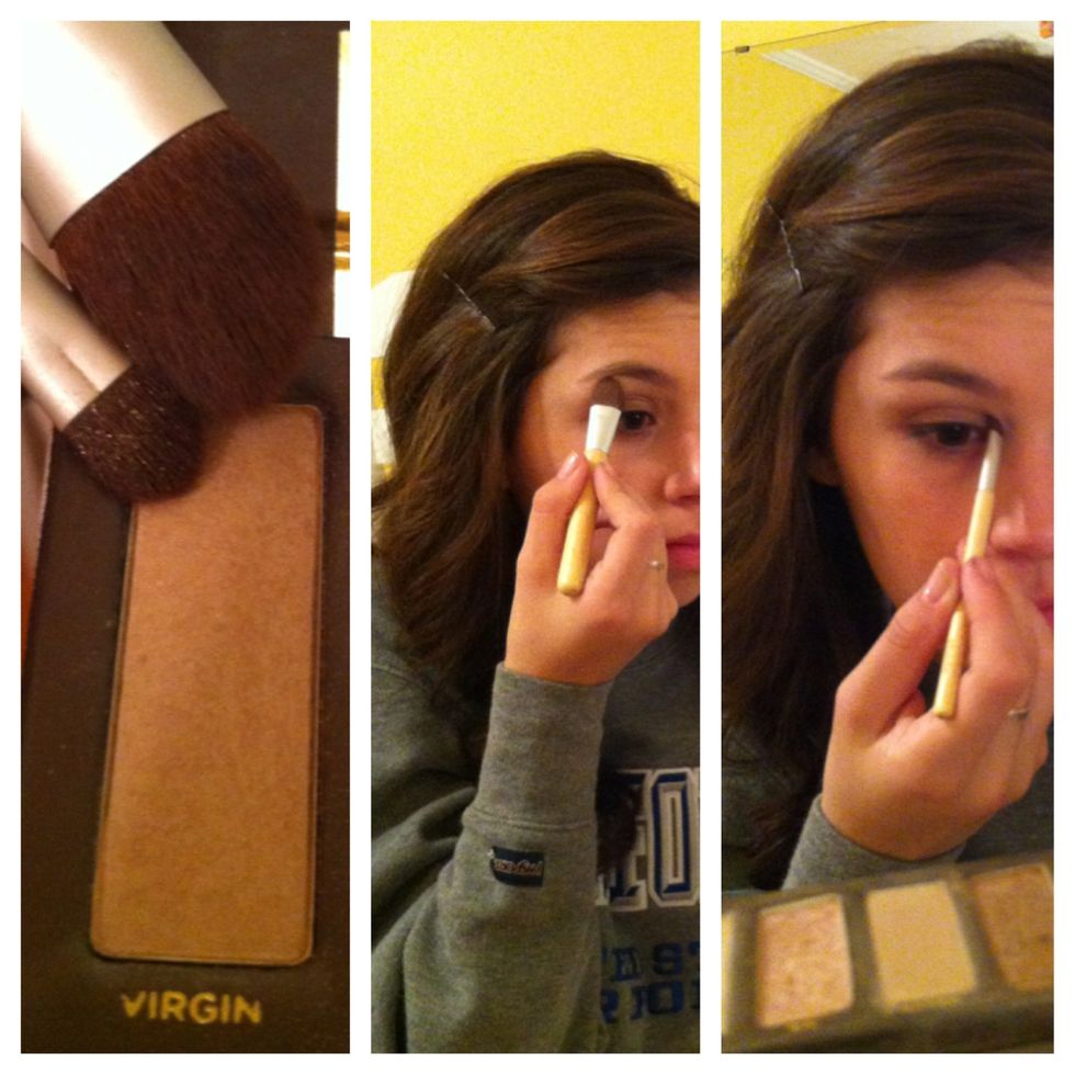 Highlight under your brow (using a fluffy dense brush) and in your inner corner (using a small, stiff brush) with a light, matte white shadow.